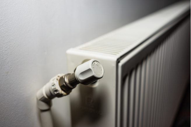 Radiators cold at the bottom: what it means (and what to check)