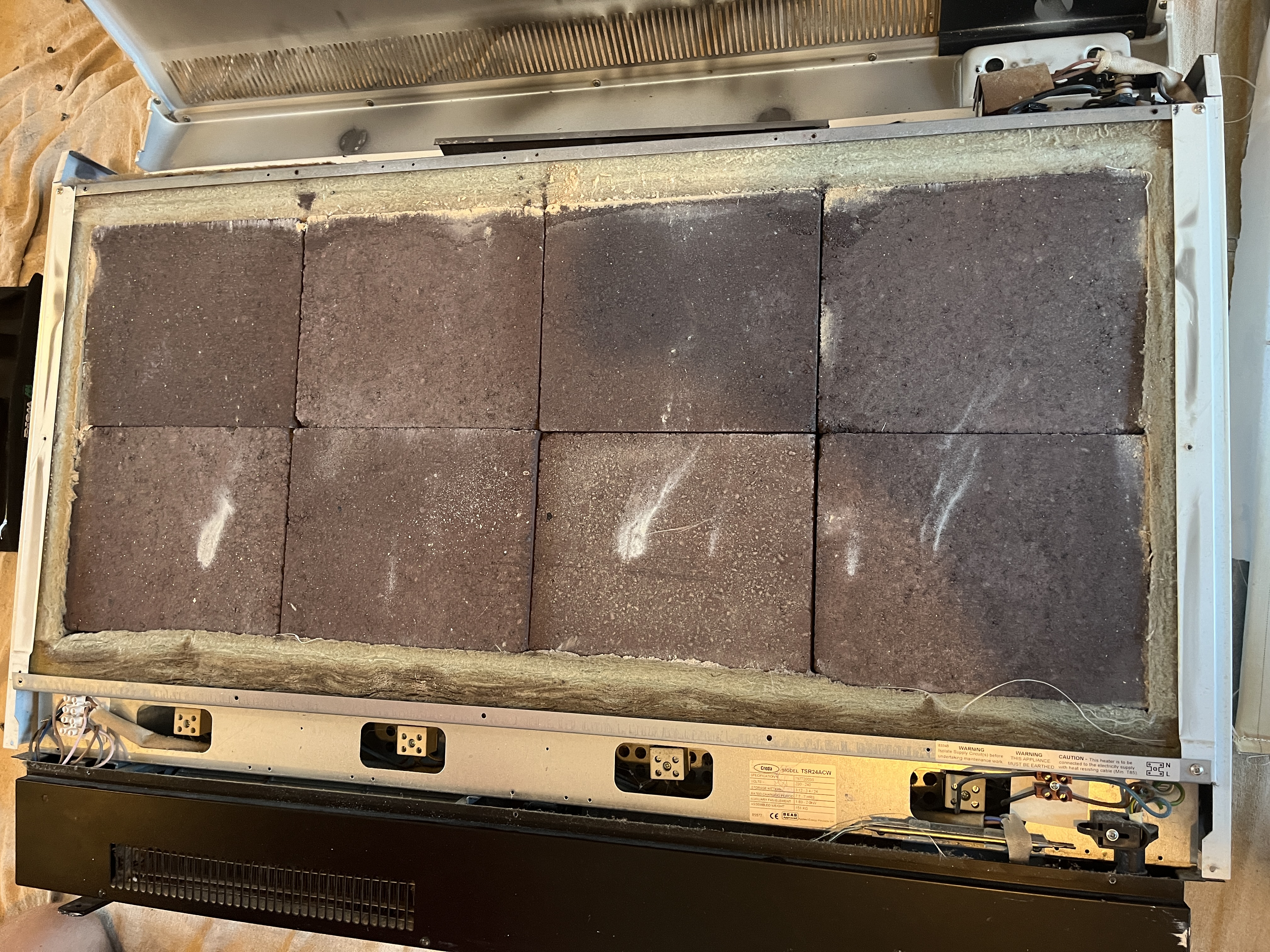 Inside a storage heater - heavy stone blocks